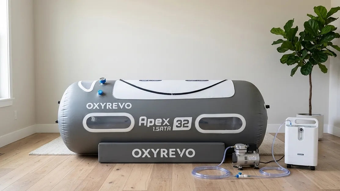 Portable hyperbaric chamber, a 1.5 ATA soft lying chamber, set up in a home spare bedroom with its compressor and oxygen concentrator