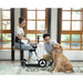 Couples using white mobility scooter