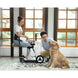 Couples using white mobility scooter